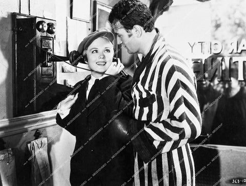 John Wayne, beautiful Jean Rogers on the telephone - 1936 film Conflict - 0431-008