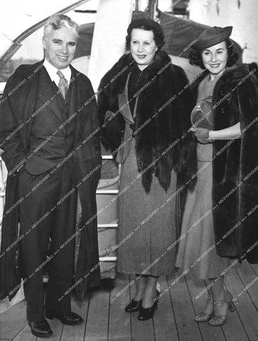 candid Charles Chaplin, Paulette Goddard and her mother 1936 - 0451-018