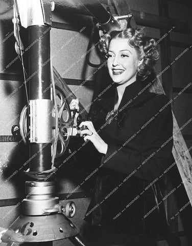 Jeanette MacDonald playing with equipment behind the scenes- 1948 film Three Daring Daughters - 0453-008