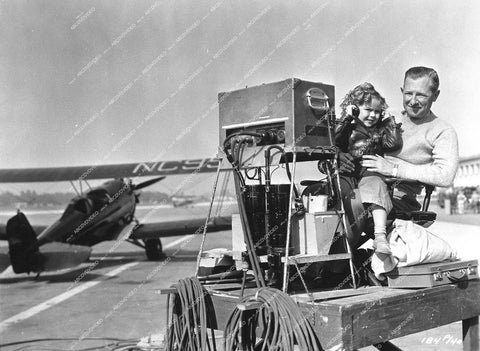 Shirley Temple, Stanley C. Chapman (Sound Man Fox Studios) on location at airport - 0457-025