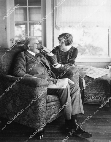candid silent film star Theodore Roberts at home w wife I think - 11030-014