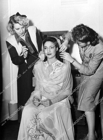 Joy Page gets stitching wardrobe lady Florence Hackett film Kismet - 11030-020