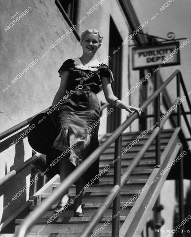 candid Lynne Carver just gets signes coming out of publicity department - 11031-006