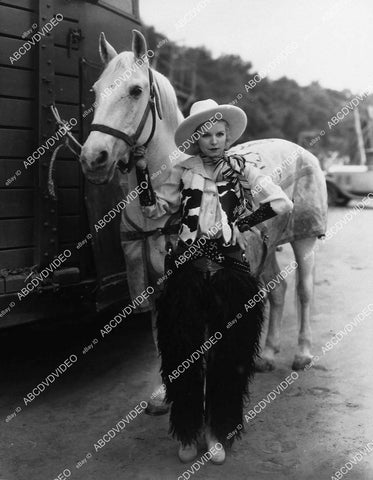 cowgirl in chaps Dolores Ray w her horse - 11031-013