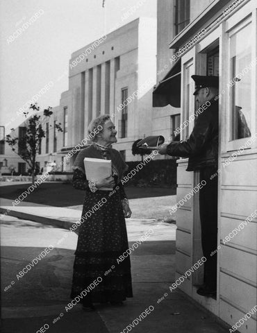 candid Adeline De Walt Reynolds at studio gate - 11031-020