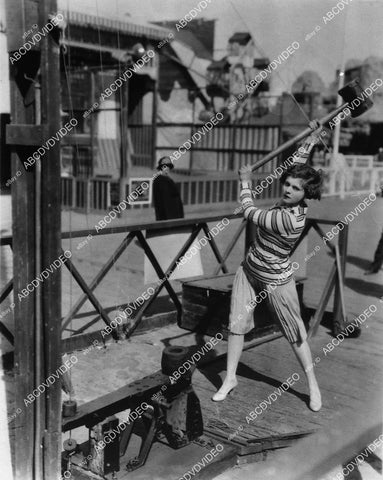 candid Vera reynolds at carnival boardwalk testing her strength w hammer - 11031-024