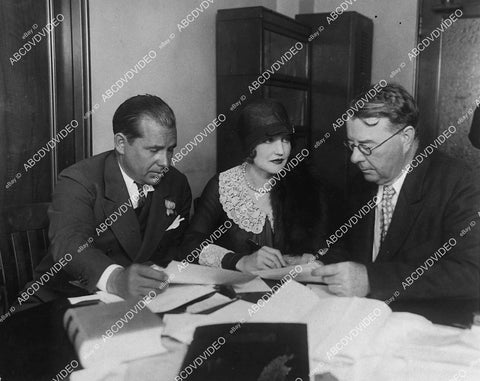 candid Agnes Ayers signing contracts w movie executives - 11032-034
