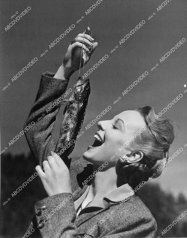 candid Anna Lee w her fish she just caught - 11042-016