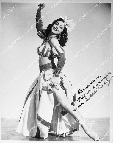 Estelita Rodriguez lifts up skirt and shows leg portrait - 11048-008