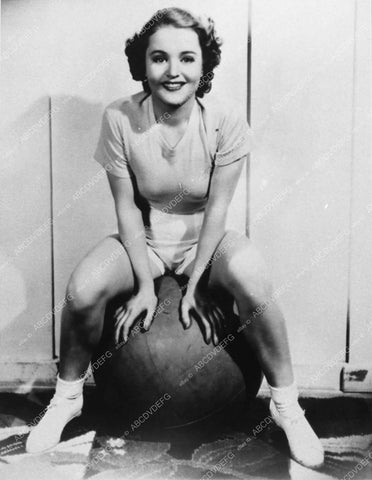 Lois Wilde pre-code cheesecake in shorts on medicine ball 12900-31