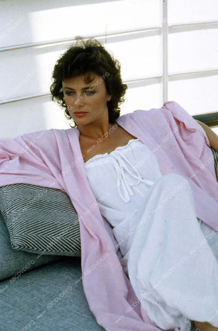beautiful Jacqueline Bisset relaxing on sofa 35m-827