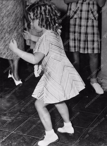 candid cute Shirley Temple dancing at a party 173-02