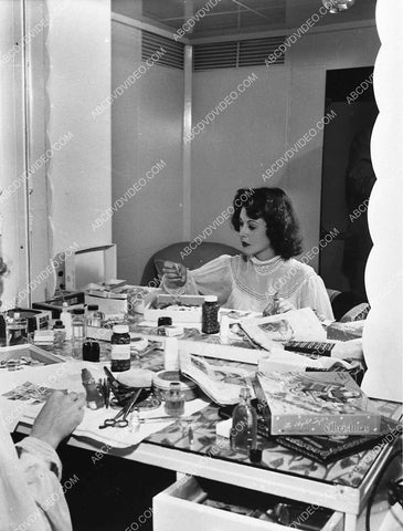 candid Hedy Lamarr taking care of Christmas business in her dressing room 755-24