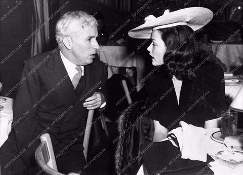 candid Hollywood Gene Tierney Charles Chaplin dining out 763-18