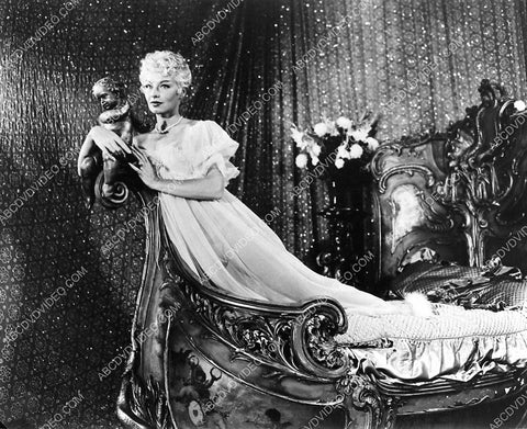 Burlesque stripper Lili St. Cyr laying in bed live show 798-06