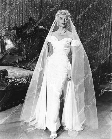 Burlesque stripper Lili St. Cyr laying in sheer lingerie live show 798-08