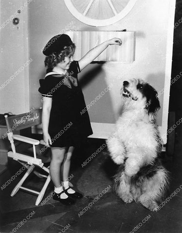 Shirley Temple feeding the dog on set film Poor Little Rich Girl 1032-18