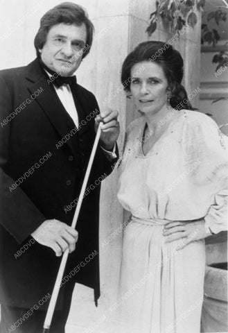 Johnny Cash challenges June Carter to a game of pool 10323-24