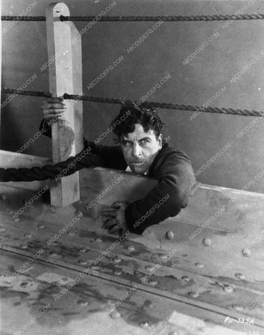 Milton Sills hanging on silent film Men of Steel 10701-08