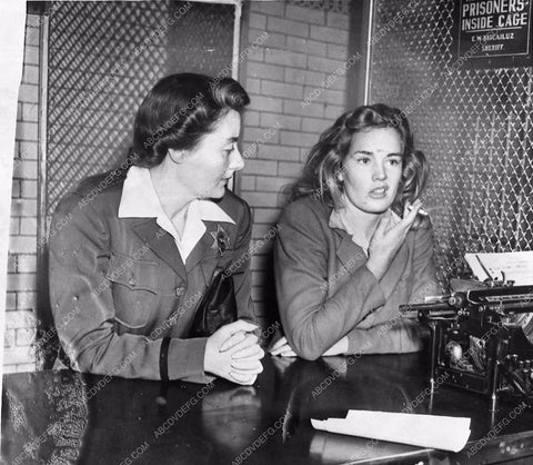 news photo Frances Farmer being booked by female sheriff staff 1104-18