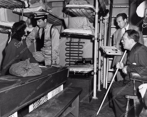 candid direstor Robert Z. Leonard Robert Taylor Stand By for Action 1197-29