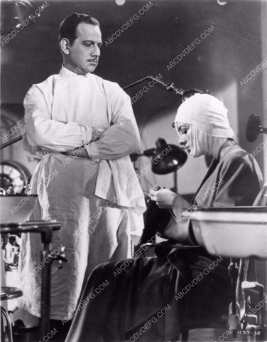 Melvyn Douglas Joan Crawford film A Woman's face 1226-30