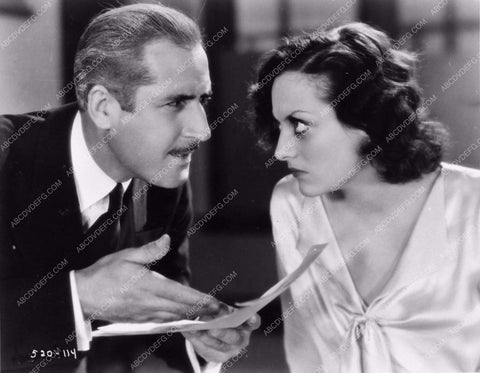 John Miljan Joan Crawford in a scene from Paid photo 1227-31