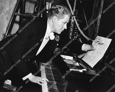 Nelson Eddy making notes at the piano 1332-24