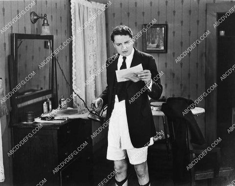 Bryant Washburn ironing his pants in his garters silent film Burglar Proof 1332-27