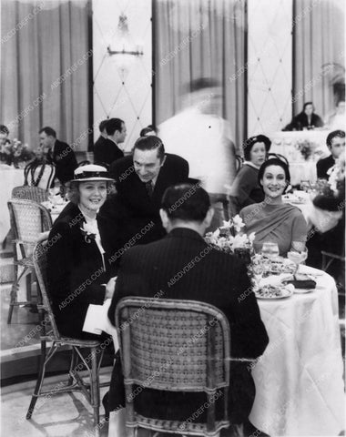Bela Lugosi with Gloria Holden candid and David Diamond dining 1396-21