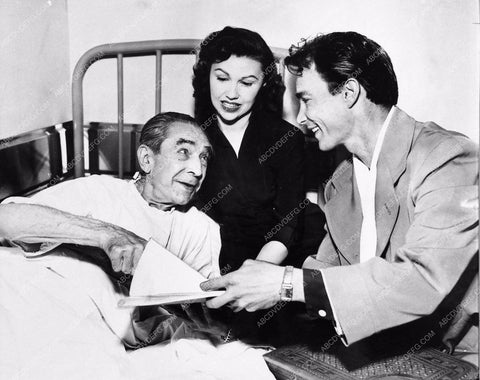 Bela Lugosi in hospital reading script for Bride of Monster 1396-27