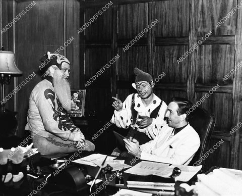 Walt Disney in his office w some Pinocchio characters I think 1499-31