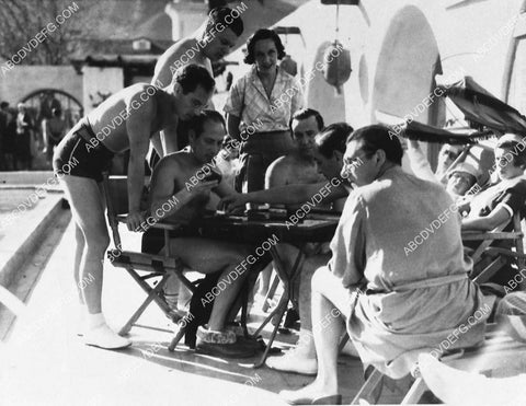 candid Groucho Marx and friends play backgammon out by the swimming pool 1509-14