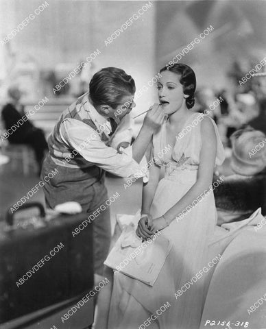 makeup man Wally Westmore gives Dorothy Lamour a touch up 1518-16