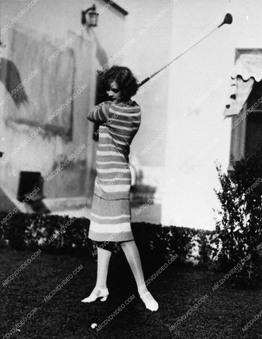 Janet Gaynor Robert Montgomery wish each other luck on the tennis court 1565-25