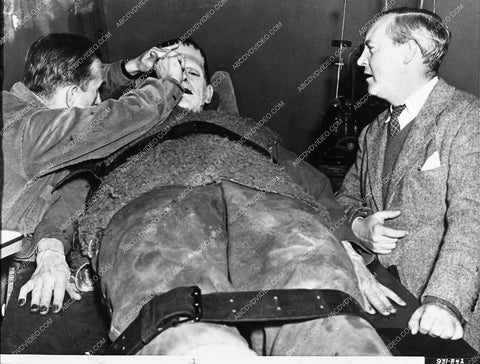 director Rowland V Lee and tech make adjust Boris Karloff on set Son of Frankenstein 1629-31