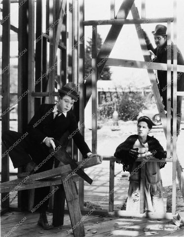 Harry Langdon on the back of a train silent film Heart Trouble 1705-32