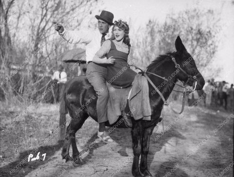 Jack & Mary Pickford on horseback 1864-15
