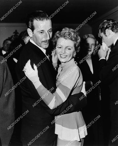 gowns by Adrian Greenberg w wife Janet Gaynor out dancing for evening 1885-10