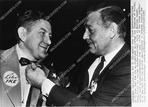 news photo Clark Gable puts I Like Ike Bow Tie on fellow supporter at convention 1909-09