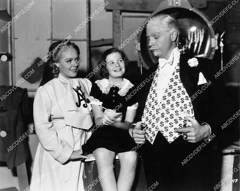 candid Alice Faye Walter Winchell and some girl on set 1921-11