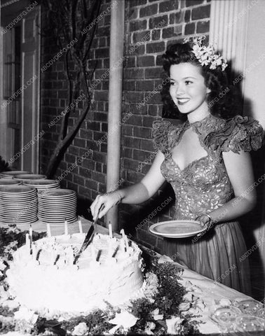 Shirley Temple cutting birthday cake 1924-11