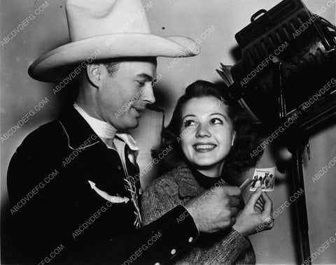 candid Bob Baker Jean Rogers looking at pics 2011-22