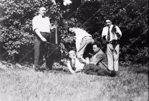 Bela Lugosi candid with friends 2086-26