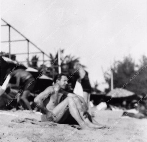 Bela Lugosi on beach candid 2086-33