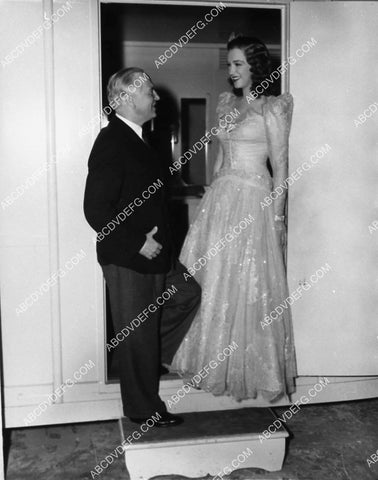 MGM model, models her gowns by Adrian Greenberg film The Women 2112-13