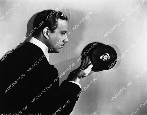 Melvyn Douglas cracking the safe film The Lone Wolf Returns 2309-30