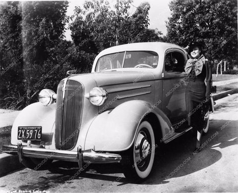 Gloria Shea and her new 1936 Chevrolet automobile 2539-13