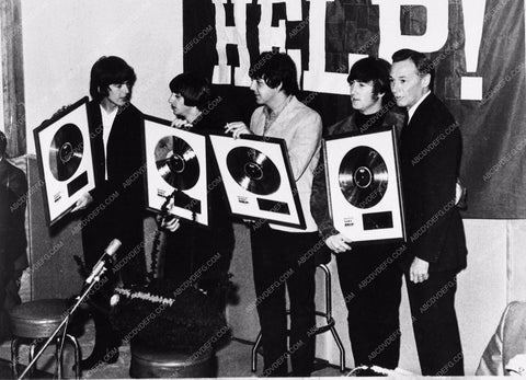 The Beatles getting gold records 2539-16
