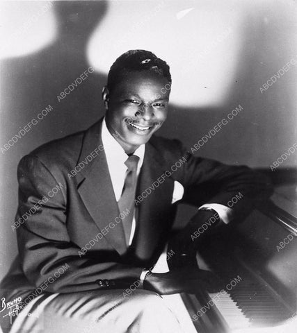 cool Nat King Cole sitting at the piano 2540-20